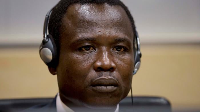 Dominic Ongwen, a Ugandan commander in the Lord’s Resistance Army, waits for the judge to arrive as he made his first appearance at the International Criminal Court in The Hague, Netherlands, Monday, Jan. 26, 2015.