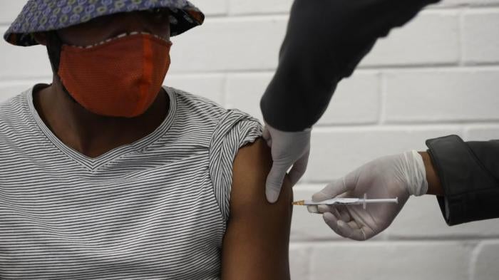 A person in Soweto, South Africa receives an injection as they participate in a clinical trial for a Covid-19 vaccine in June 2020. 