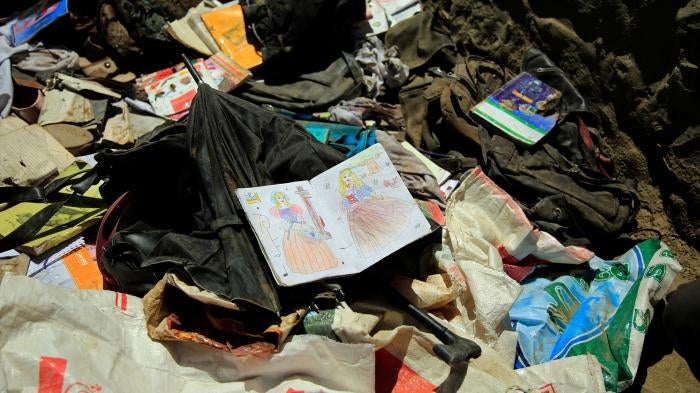 Books, notebooks, and other school supplies are left behind after May 8's deadly bombings near a school in Kabul, Afghanistan, Sunday, May 9, 2021.