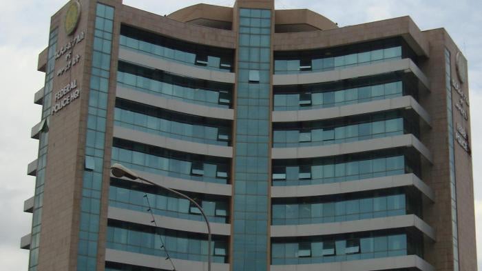 Exterior of a building with the words "Federal Police HQ" on it