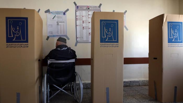 A voter who uses a wheelchair at a polling place in Erbil, the capital of the Kurdistan Region of Iraq, on May 12, 2018. 