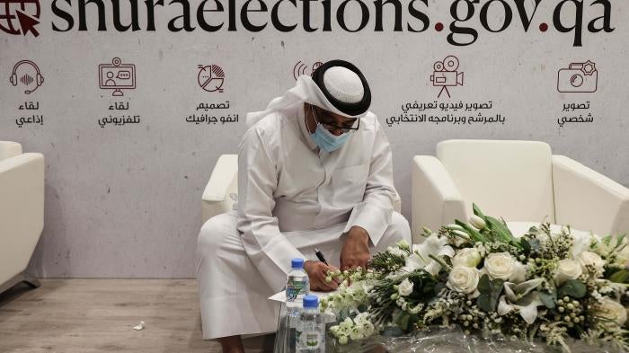 A Qatari candidate registers to run in the country's upcoming election as a member of its top advisory panel, known as the Shura Council, in the capital Doha, on August 22, 2021.