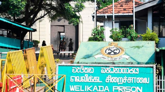 Prison guards at the main entrance of Welikada prison in Colombo, Sri Lanka, November 2019.