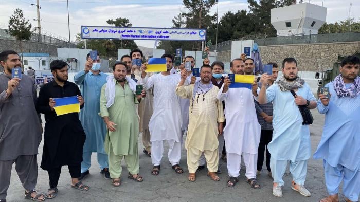 Ukrainian citizens gathered outside Hamid Karzai International airport in early September 2021 asking Ukraine to evacuate them, Kabul Afghanistan.