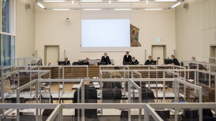 Judge Anne Kerber (center) stands in a hall of the regional court in Koblenz, Germany on June 4, 2020.