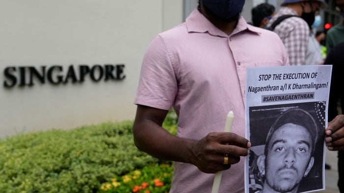 Activists attend a candlelight vigil against the impending execution of Nagaenthran K. Dharmalingam outside the Singaporean embassy in Kuala Lumpur, Malaysia
