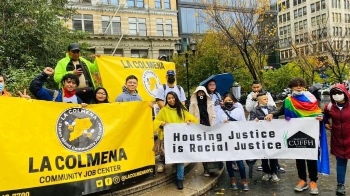Community members from local organizations La Colmena and CUFFH participate in the 11 mile march for immigration reform, on Friday, November 12, 2021 in New York City. 