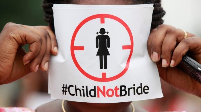 A woman protests against underage marriage, Lagos, Nigeria. 