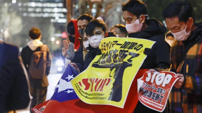 Myanmar people living in Japan protest against military rule in their country on the first anniversary of the coup, outside the Japanese prime minister's office in Tokyo, February 1, 2022.