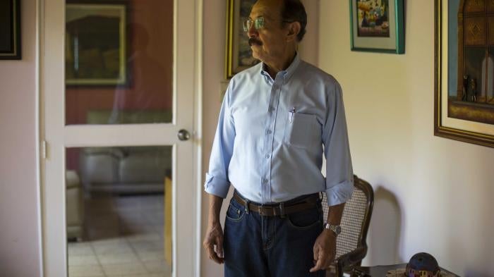 Retired Sandinista Gen. Hugo Torres poses for portrait at his home, in Managua, Nicaragua, May 2, 2018. One of a large group of opposition leaders rounded up prior to the 2021 presidential elections, Torres died in prison at the age of 73 on February 12, 2022.