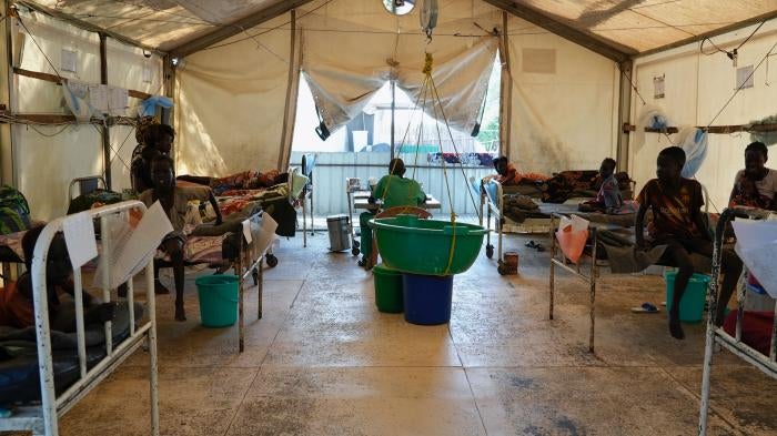 People are seen at a hospital run by Medicines Sans Frontieres (Doctors Without Borders) in Old Fangak in Jonglei state, South Sudan, December 28, 2021.
