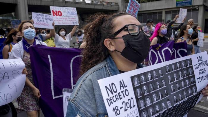 People protest a bill that would have increased sentences for women who terminate their pregnancies, prohibited same-sex marriage and banned discussion of sexual diversity in schools, in Guatemala City, Saturday, March 12, 2022