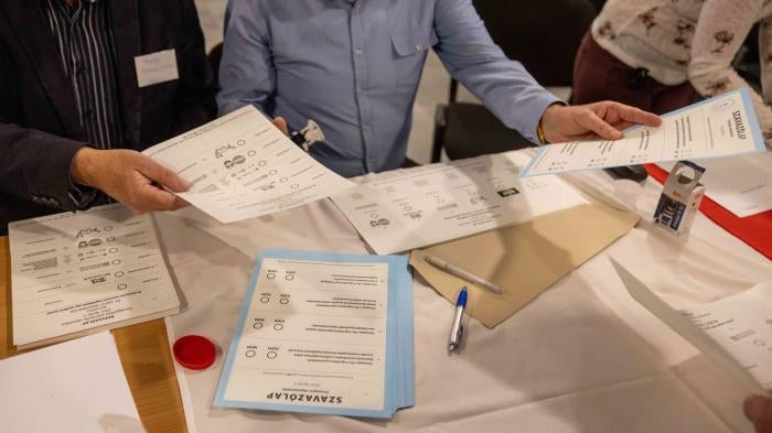 Ballot papers are seen on a table during the general parliamentary elections in Budapest, Hungary