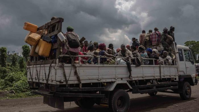 A truck full of people cut off from traffic during clashes between the Congolese army and M23 rebels in Kibumba, on the outskirts of Goma in North Kivu, Democratic Republic of Congo, June 1, 2022.