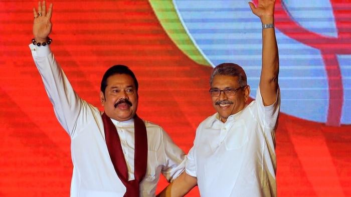 Mahinda Rajapaksa, left, and his brother Gotabaya Rajapaksa waving to supporters in Colombo, Sri Lanka, in 2019.