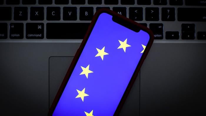 The European Union logo is seen on a portable mobile device