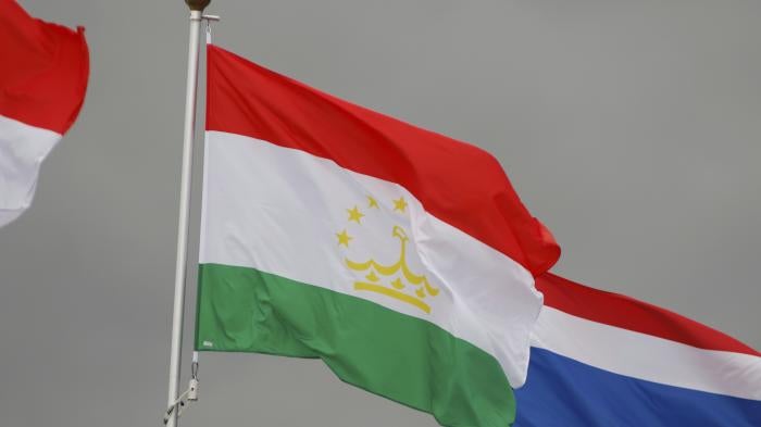 The Tajikistan flag. 