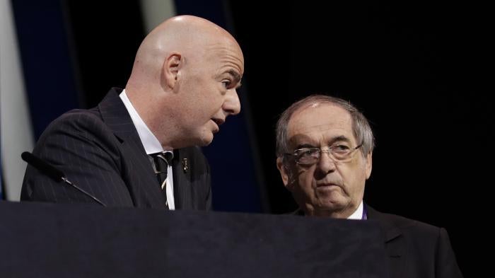 FIFA President Gianni Infantino, left, speaks with French Football Federation President Noel Le Graet