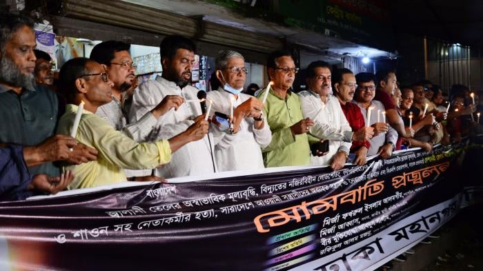 Bangladesh Nationalist Party activists hold a candlelight vigil
