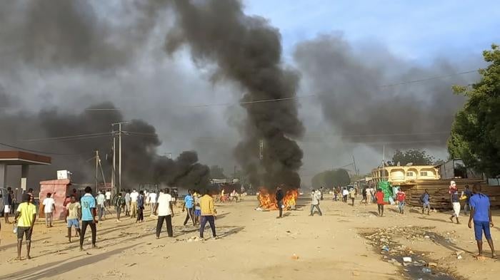 A barricade is set on fire during anti- government barricades in N'Djamena, Chad, October 20, 2022. 