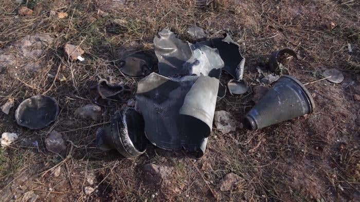 An image showing physical remnants of 9M27K-series cluster munition rockets at the Maram camp in Syria.