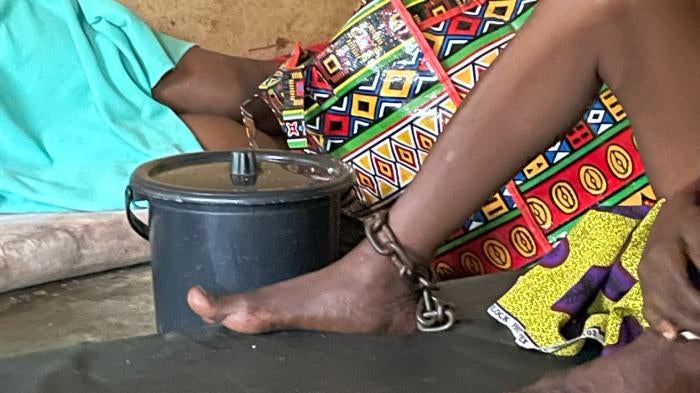 A woman with a real or perceived psychosocial disability is chained in a room at Mount Horeb Prayer Camp in Ghana.