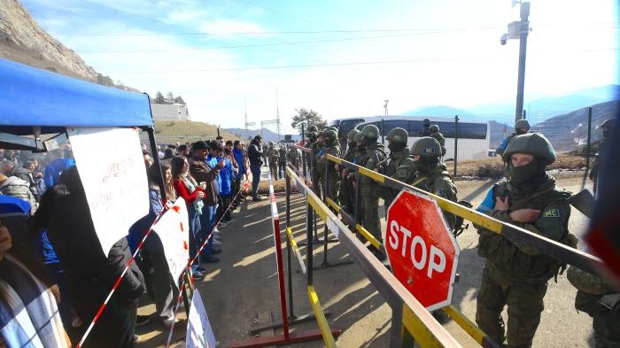 Azerbaijanis protesting on the Lachin road, opposite Russian peacekeeping forces, in Nagorno Karabakh, leading to the closure of the road since December 12, 2022. 