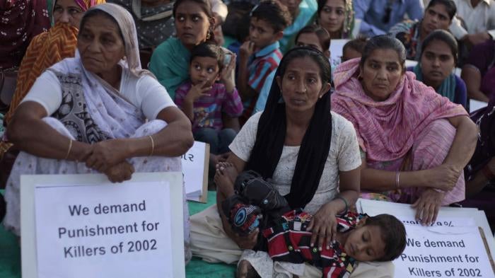 Victims of the 2002 anti-Muslim riots in Gujarat state, which left more than 1,000 dead, gather for a protest