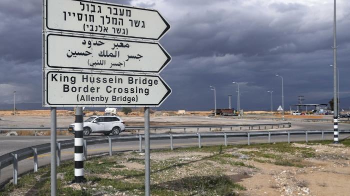  A road sign points to the Allenby/King Hussein Bridge crossing to Jordan, in the city of Jericho in the Israeli occupied West Bank.