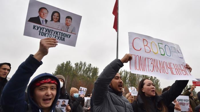 Demonstrators protest against a controversial border demarcation deal… and demand to free detained opposition politicians and activists, in Bishkek on October 24, 2022 