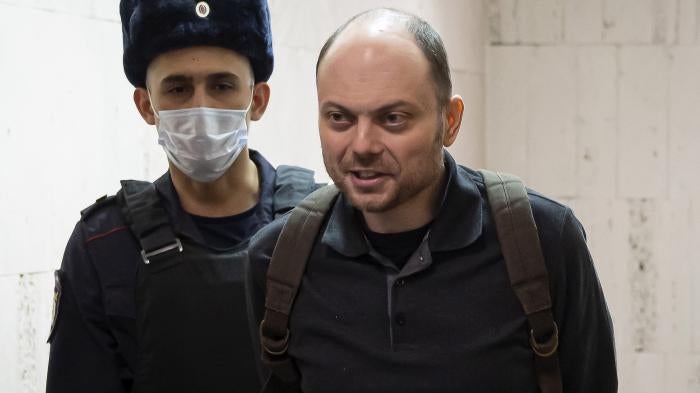 Russian opposition activist Vladimir Kara-Murza is escorted to a hearing in a court in Moscow, Russia, February 8, 2023