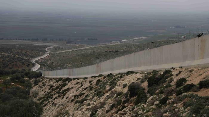 A picture of the cement wall separating Syria and Turkey near Haram in Northwest Syria on March 14, 2023.