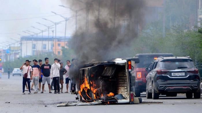 A vehicle burned during ethnic violence in Imphal, Manipur, India, May 4, 2023.