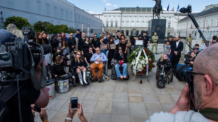 People with disabilities and supporters protest outside the presidential palace to demand a new law on personal assistance, Warsaw, Poland.