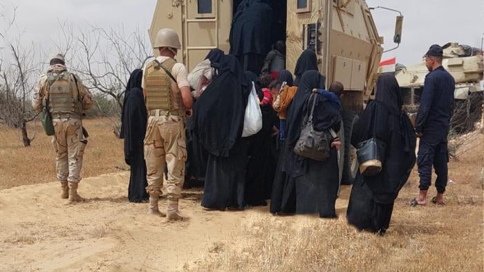 A photo published by a pro-army militia Facebook page, Uswod Al-karama, (which was later deleted) showing a group of women and children, whom the group described as the wives and children of men of the Islamic State affiliate, being arrested by the Egyptian army near al-Moqat’a area south of Sheikh Zuwayed in North Sinai, Egypt.
