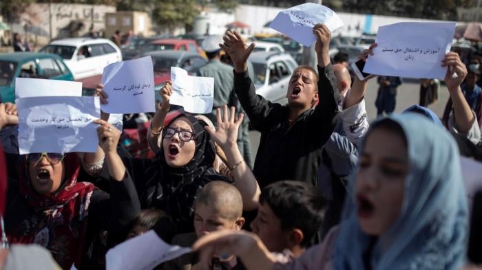 Afghan women chant during a protest in Kabul, Afghanistan, October 21, 2021.