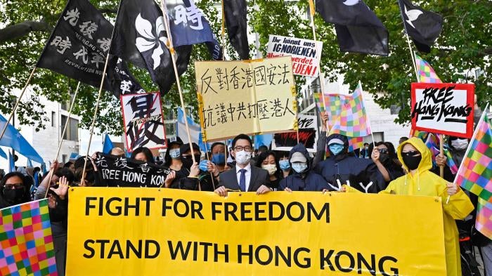 The Hong Kong activist Nathan Law takes part in a demonstration outside the Foreign Office in Berlin, September 1, 2020.