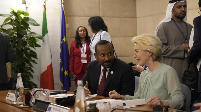 European Commission President Ursula von der Leyen, right, talks with Ethiopian Prime Minister Abiy Ahmed Ali during an international conference on migration in Rome, July 23, 2023.