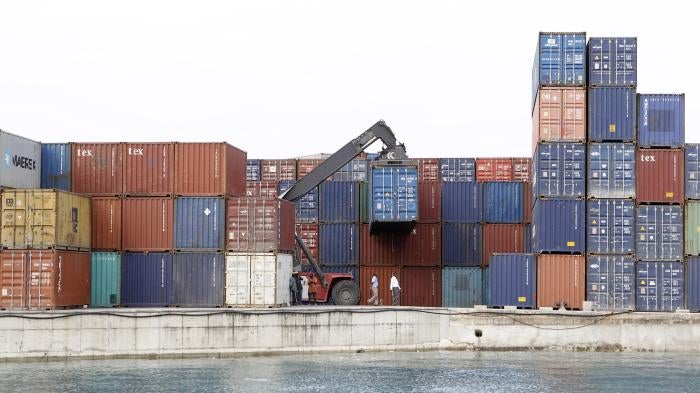A crane arranges containers at the Port of Zanzibar, Tanzania, July 19, 2012.