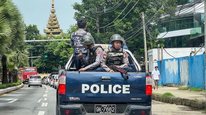: Police patrol the 76th Martyrs' Day in Yangon, Myanmar on July 19, 2023. 