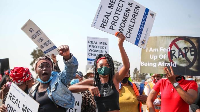 Community members protest against gender-based violence in Vlakfontein, South Africa, August 25, 2021. 
