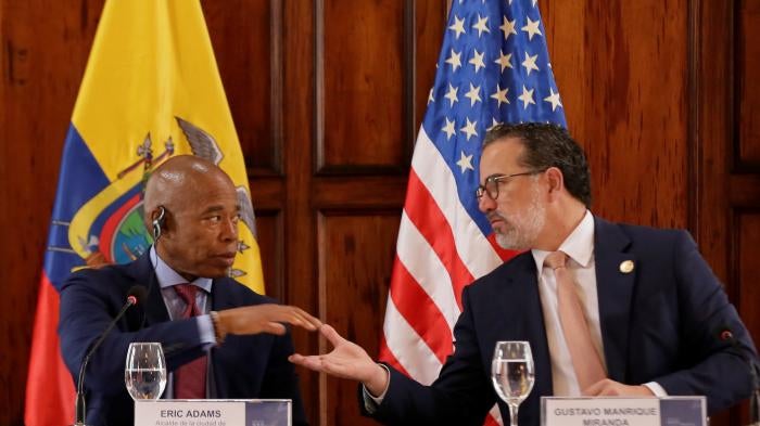 Ecuadorean Foreign Minister Gustavo Manrique, right, shakes hands with New York City Mayor Eric Adams