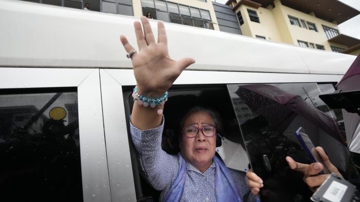Former Senator Leila de Lima waves to supporters after leaving the Muntinlupa City trial court in the National Capital Region, Philippines, November 13, 2023.