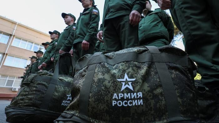 Conscripts called up for military service in the Russian army line up in Simferopol, Crimea, before their deployment. April 25, 2023. 