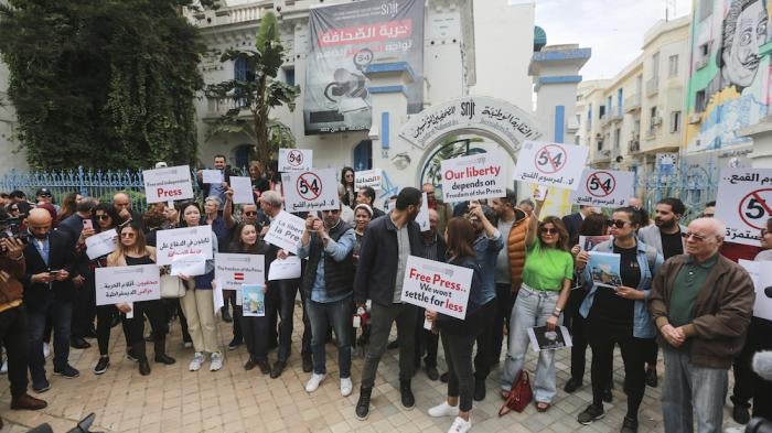 The Tunisian Journalists Union (SNJT) protests against the sentencing of journalist Khalifa Guesmi to five years in prison in Tunis, Tunisia, May 18, 2023. 