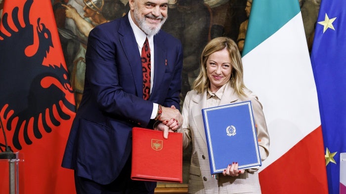 Albania's Prime Minister Edi Rama (L) and Italy's Premier Giorgia Meloni shake hands after the signing of a memorandum of understanding on migrant detention centers during a meeting in Rome, Italy, November 6, 2023.