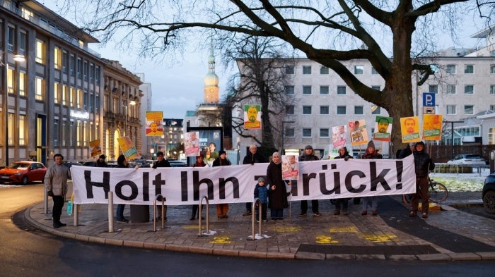 A vigil on 18 January 2024 in Dortmund, Germany, on the anniversary of the deportation of Tajikistan opposition activist Abdullohi Shamsiddin. The banner reads: ‘Bring Him Back!’
