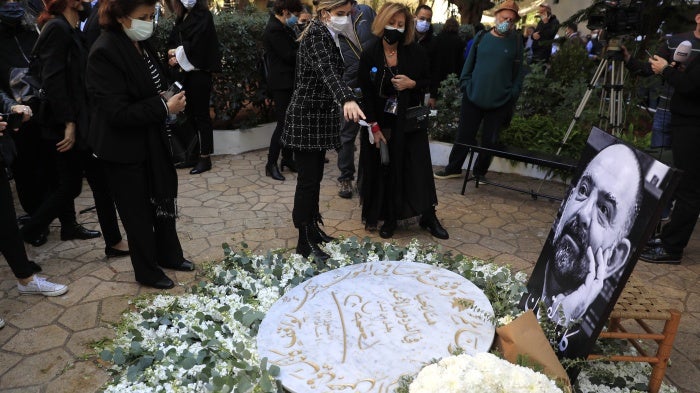 Mourners and activists at a monument for Lokman Slim during his memorial service, Beirut, Lebanon, February 11, 2021.