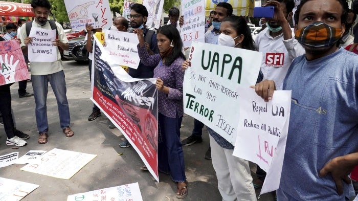 Activists demand justice for 84-year-old Father Stan Swamy, the Indian Jesuit priest and tribal rights activist, who had passed away earlier that month in New Delhi, July 23, 2021.