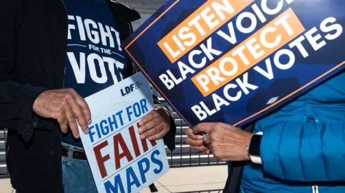 Activists gather outside the US Supreme Court for oral arguments in the Alexander V. South Carolina Conference of the NAACP gerrymandering case in Washington, DC, October 11, 2023.